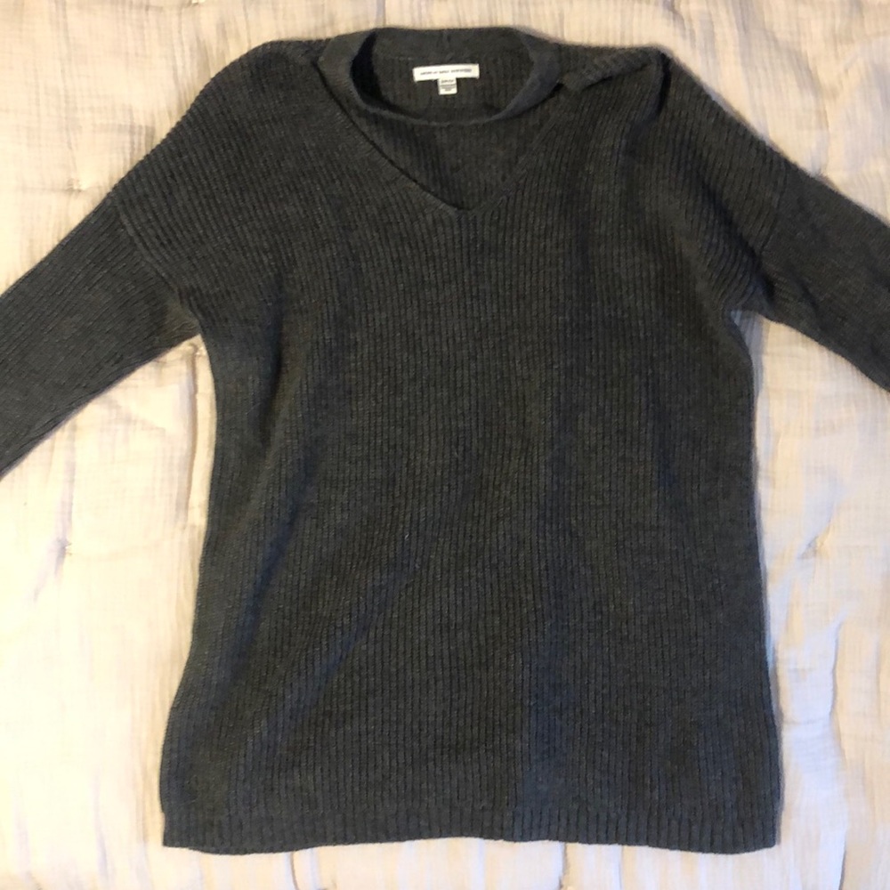 Sweater with built in choker collar.